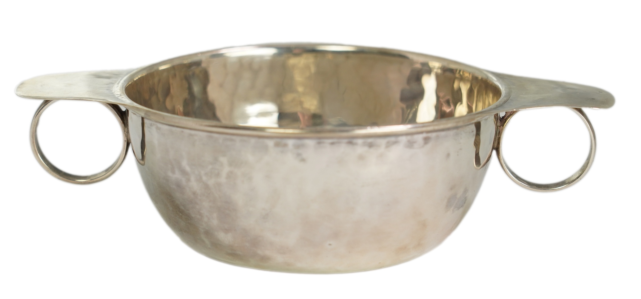 A George V Arts & Crafts Liberty and Co silver porringer